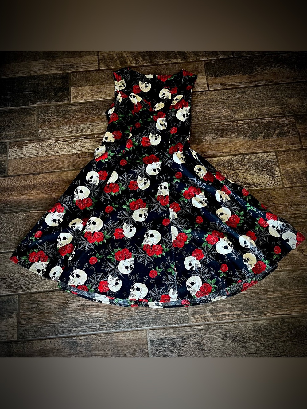 Hell Bunny skulls roses and spiderwebs on a black background dress L